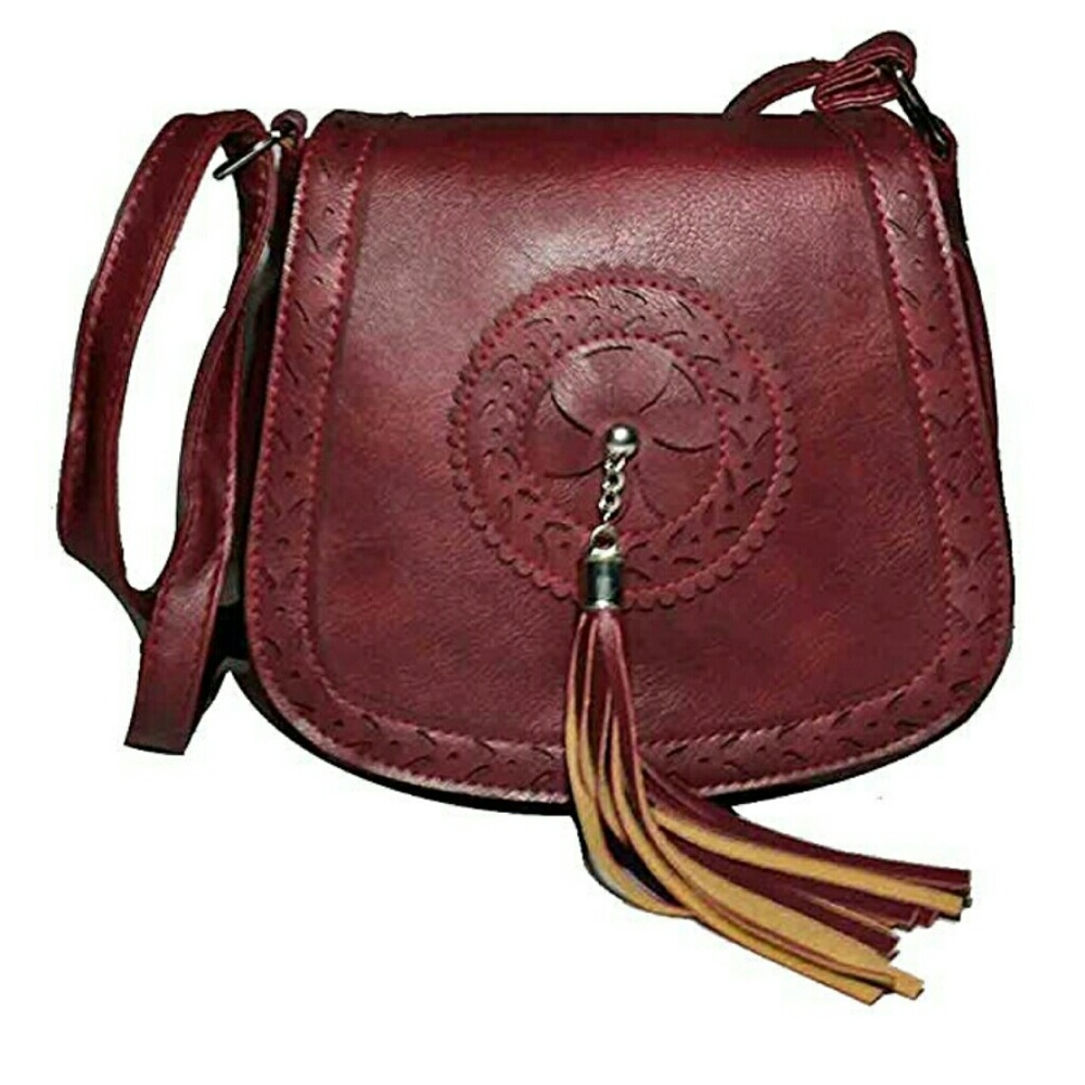 Peche crossbody bag with tassle